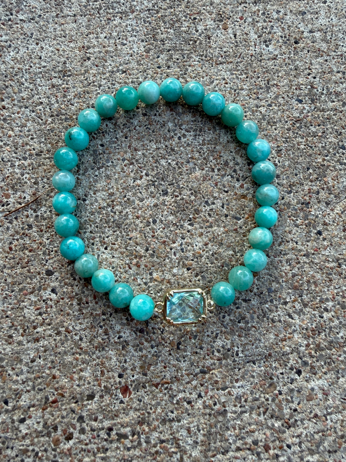 Jade with blue rhinestone connector